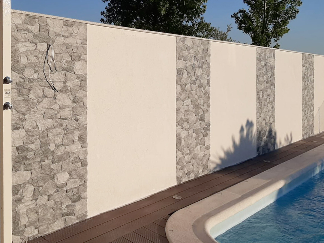 construcción de piscina y muro